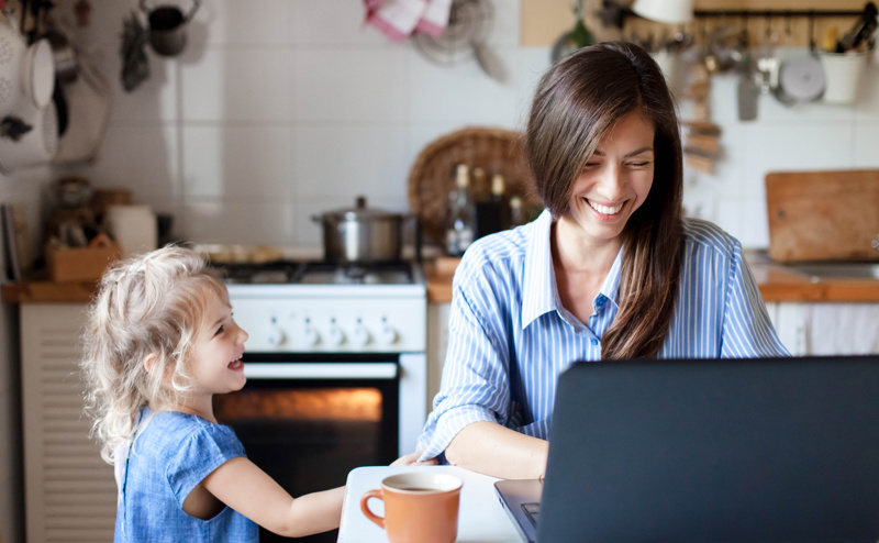 Woman and child at laptop
